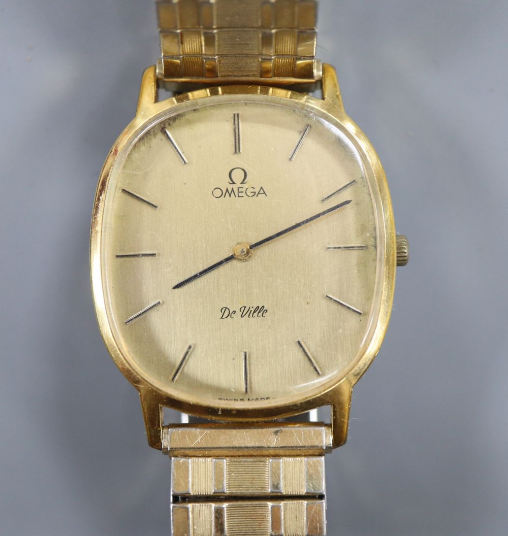 A gentlemans 1980s steel and gold plated Omega De Ville manual wind wrist watch, on associated strap, with box.